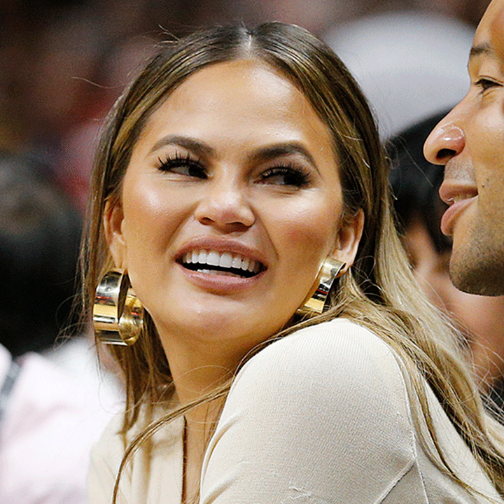 Chrissy Teigen and John Legend's Courtside Crash With Dwyane Wade Is Now Framed in Their House