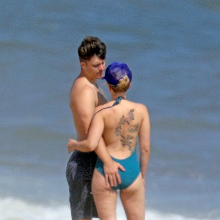 Scarlett Johansson and Colin Jost Show PDA While Enjoying a Stroll on the Beach