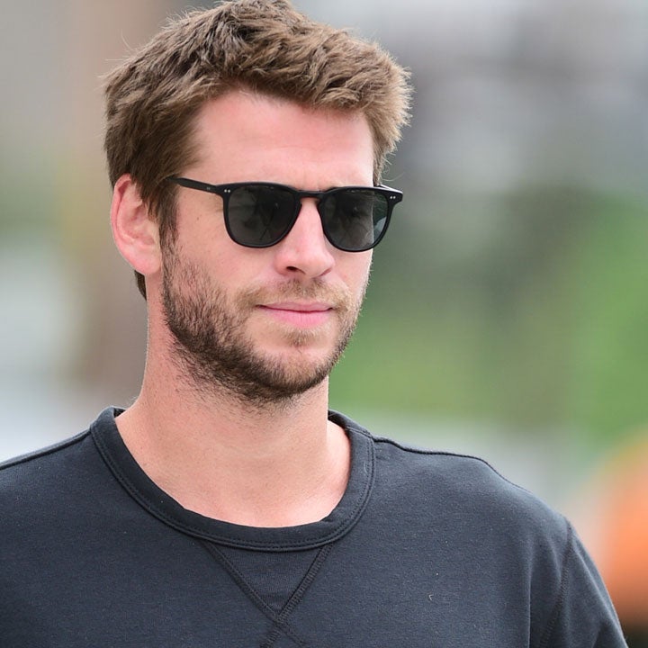 Liam Hemsworth Is All Smiles While Vacationing With Family After Miley Cyrus Split