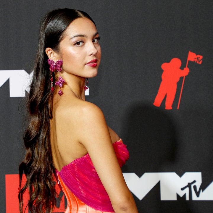 Olivia Rodrigo Wins First MTV VMA Award, Glows in Fuschia Dress