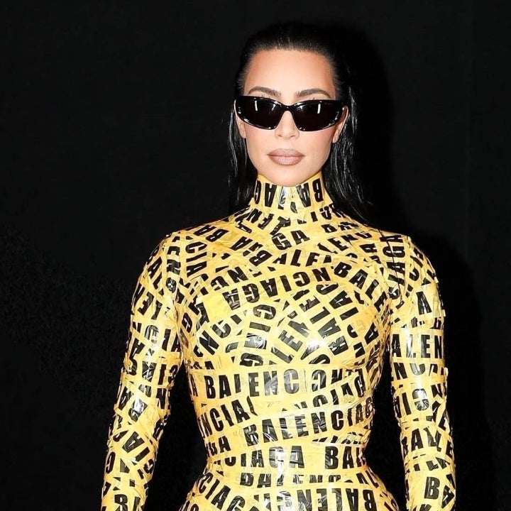 Kim Kardashian Wears Caution Tape Catsuit at Paris Fashion Week