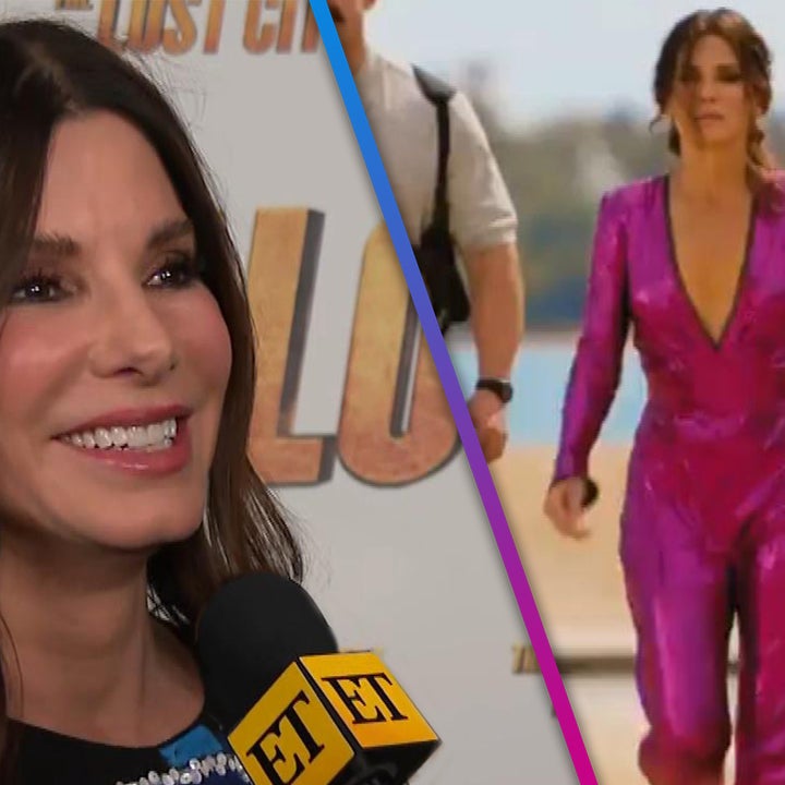 Sandra Bullock Says Her Purple Jumpsuit Is ‘Real Star’ of ‘Lost City'