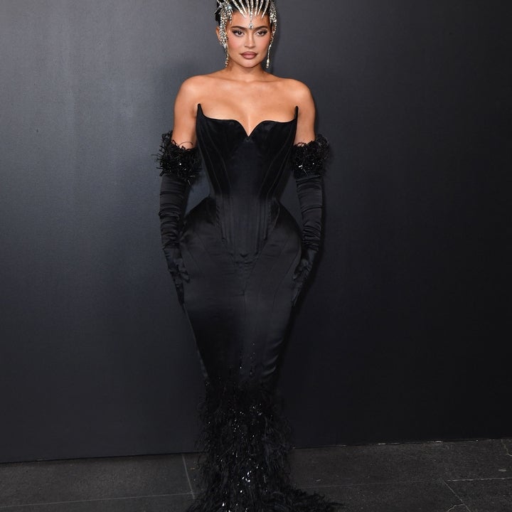 kylie jenner red carpet dresses Kylie Jenner Wore Red Asymmetric Jean Paul Gaultier Dress at the 2023 Met  Gala