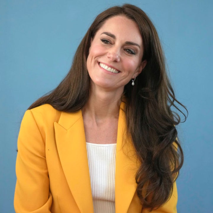 Kate Middleton Takes Off Her Shoes During Visit With Roman Kemp