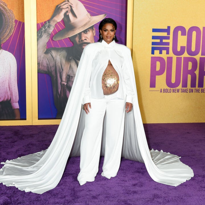 paula abdul purple dress Paula Abdul wearing her hair very long with large waves