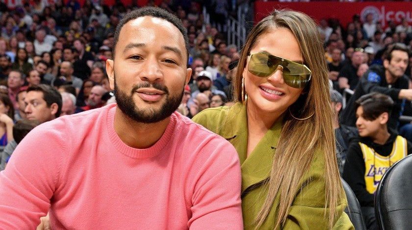 John Legend and Chrissy Teigen at Los Angeles Clippers vs Los Angeles Lakers game
