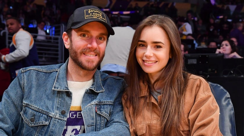Lily Collins and Charlie McDowell at Los Angeles Lakers game