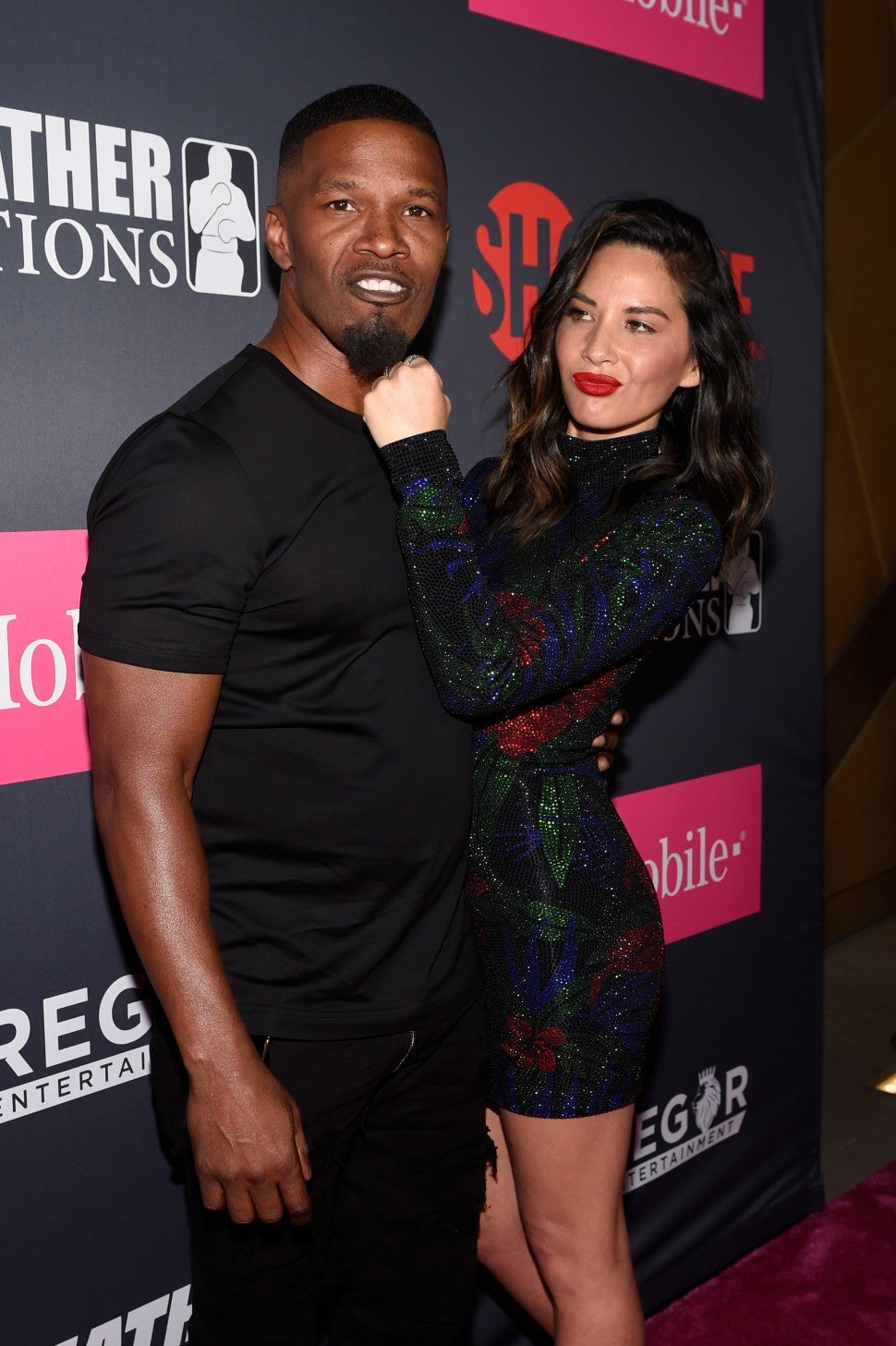 Jamie Foxx and Olivia Munn pose together at the Mayweather vs. McGregor fight