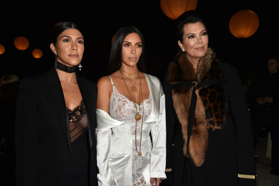 Kourtney and Kim Kardashian with Kris Jenner