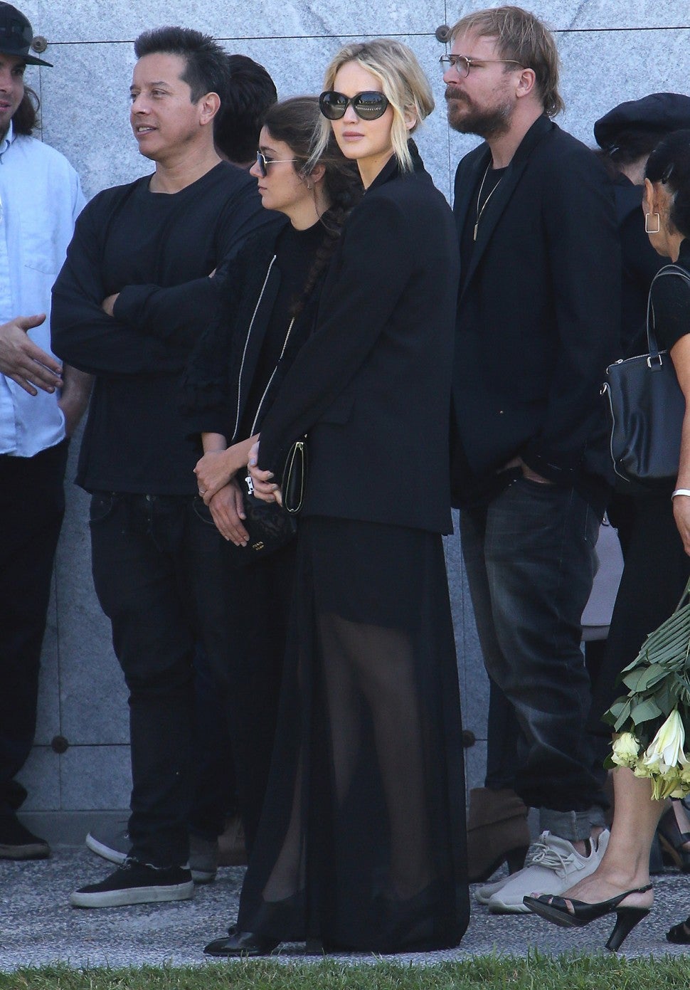 Jennifer Lawrence attends Anton Yelchin's service