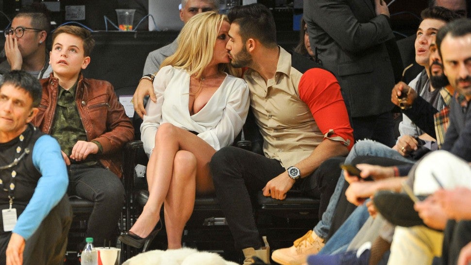 Britney Spears and Sam Asghari kiss at NBA game