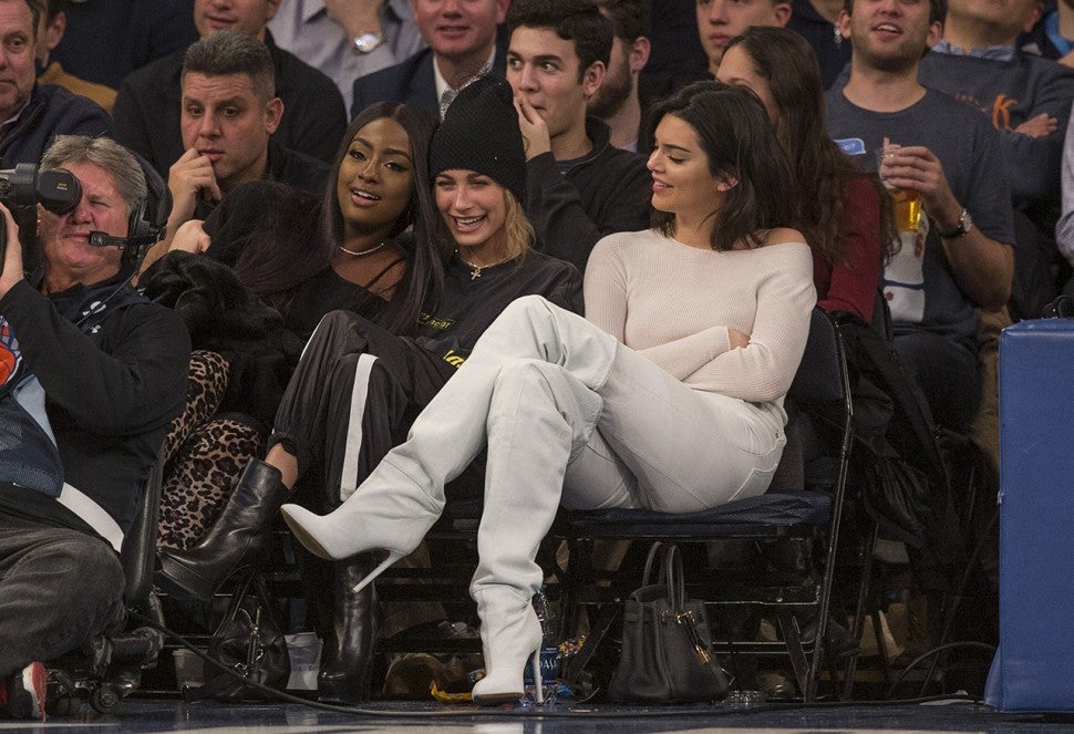 Kendall Jenner and Hailey Baldwin sit courtside