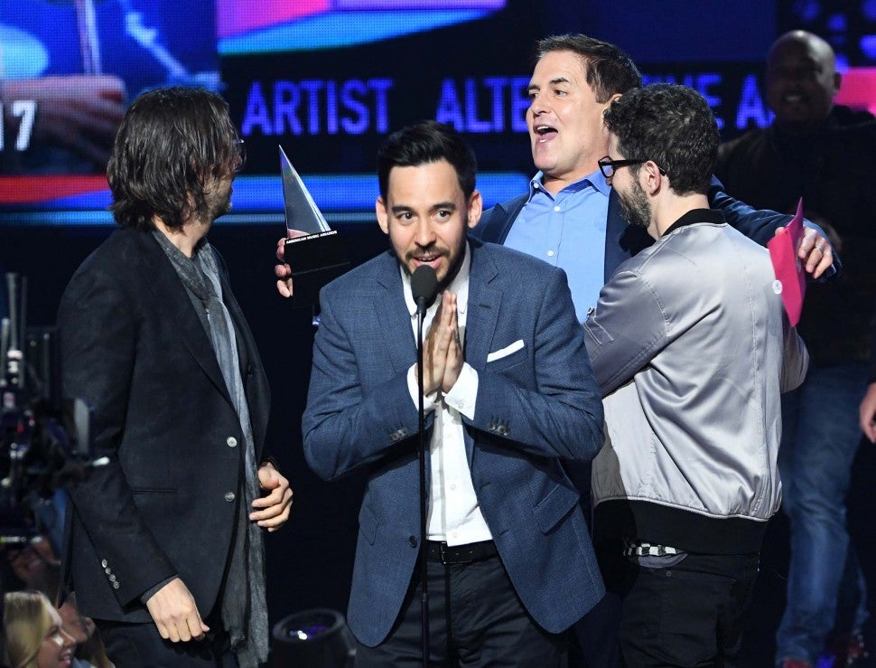 Mark Cuban and Linkin Park on stage at the 2017 American Music Awards at the Microsoft Theater in LA