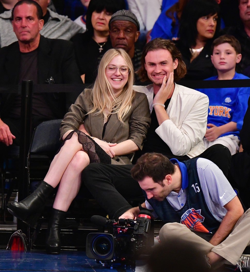 Dakota Fanning and boyfriend at Knicks game
