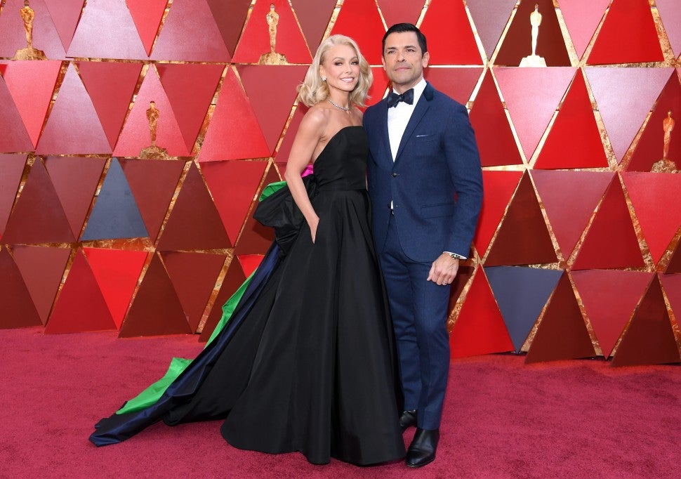 Kelly Ripa and Mark Consuelos at 90th Annual Academy Awards