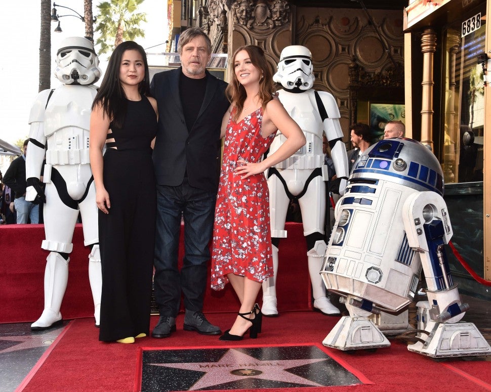 Kelly Marie Tran and Billie Lourd support Mark Hamill at his Walk of Fame Ceremony in Hollywood.