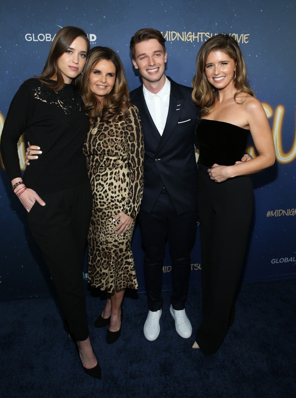 Patrick Schwarzenegger, his mom and sisters at the 'Midnight Sun' premiere in Hollywood