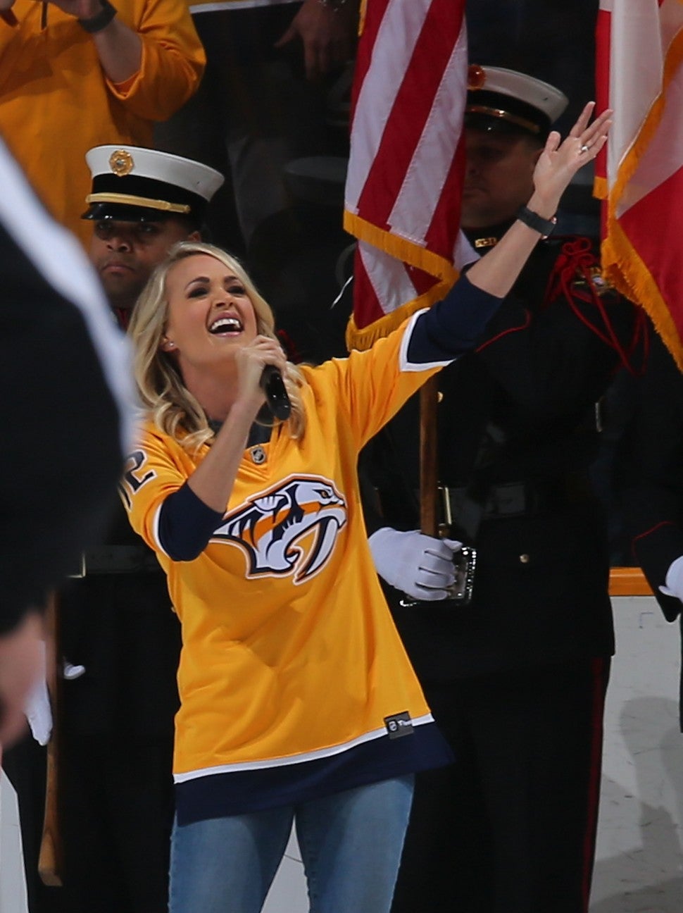 Carrie Underwood singing at Nashville Predators game