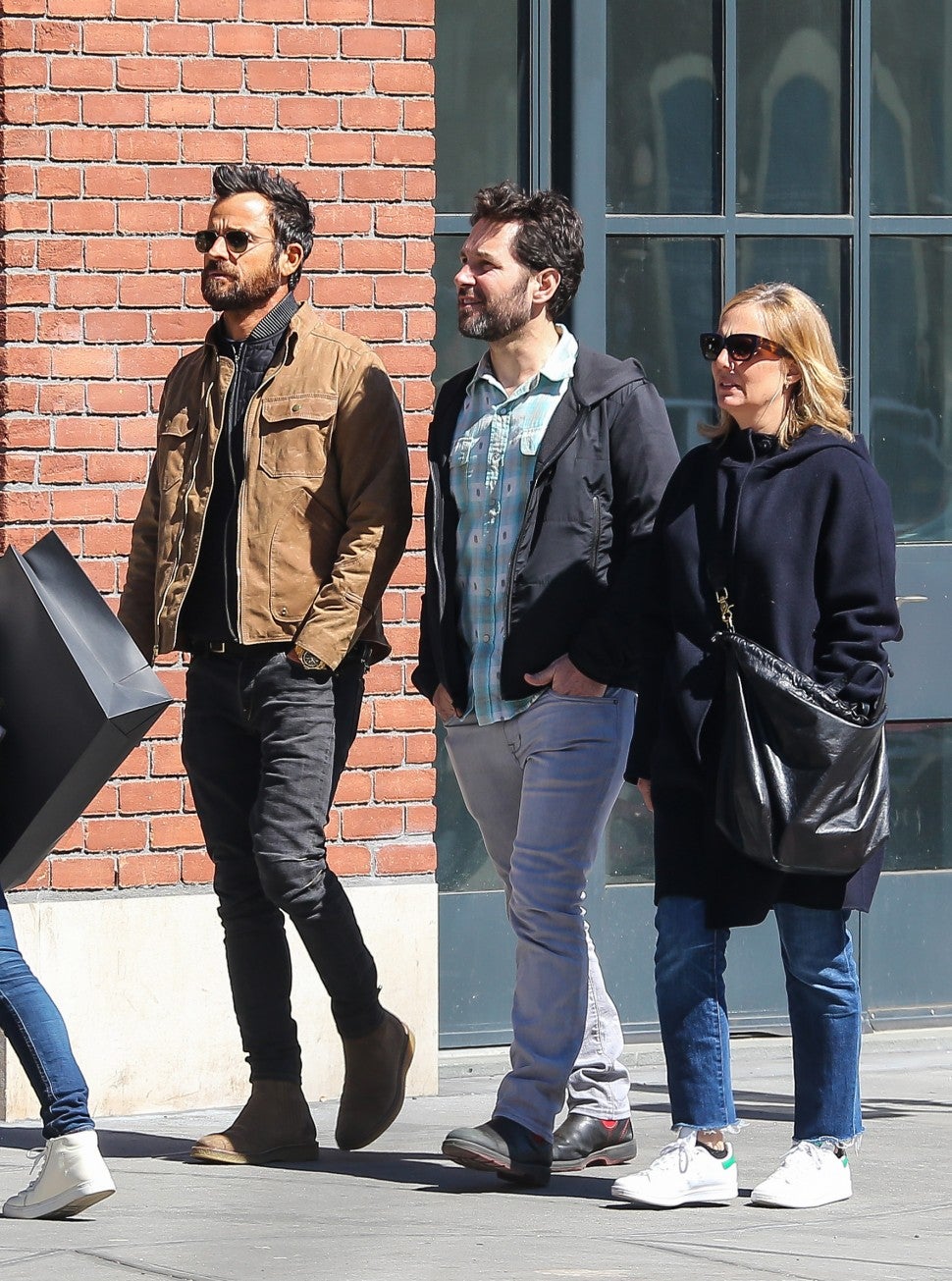 Justin Theroux walks with Paul Rudd and his wife in NYC on Easter Sunday.