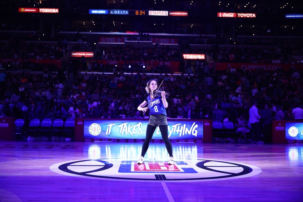 Lindsay Stirling playing at Clippers game