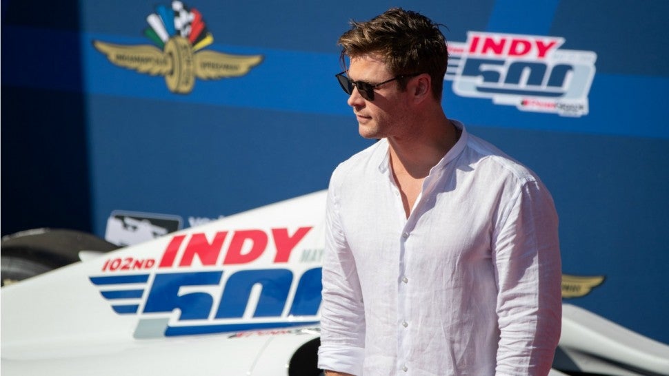 Actor Chris Hemsworth poses for a photo on the red carpet before the Indianapolis 500 on May 27, 2018 at Indianapolis Motor Speedway in Indianapolis, Indiana.