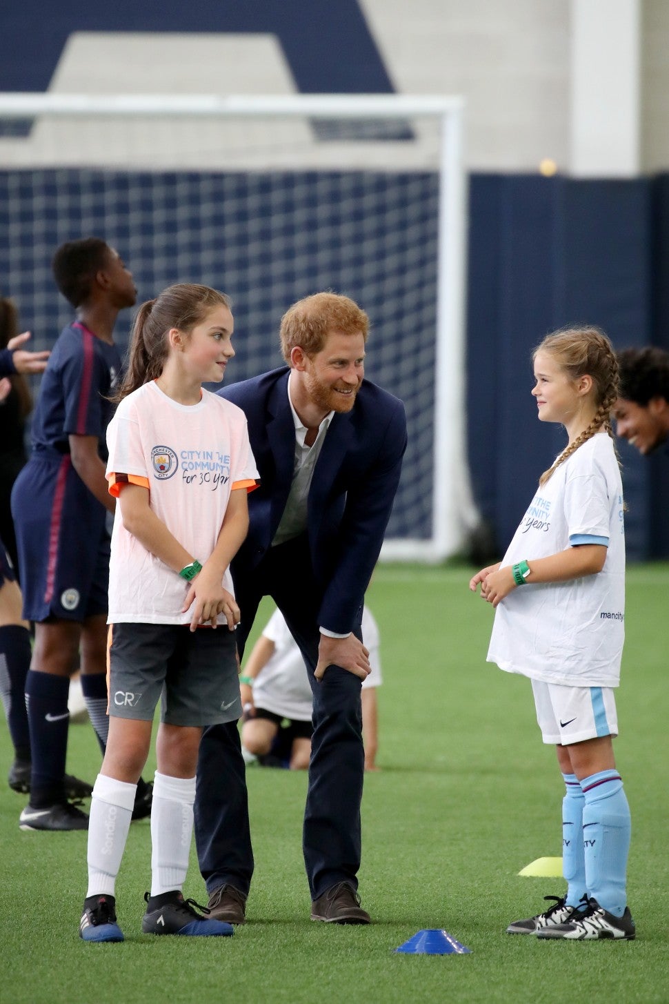Prince Harry at Manchester soccer club