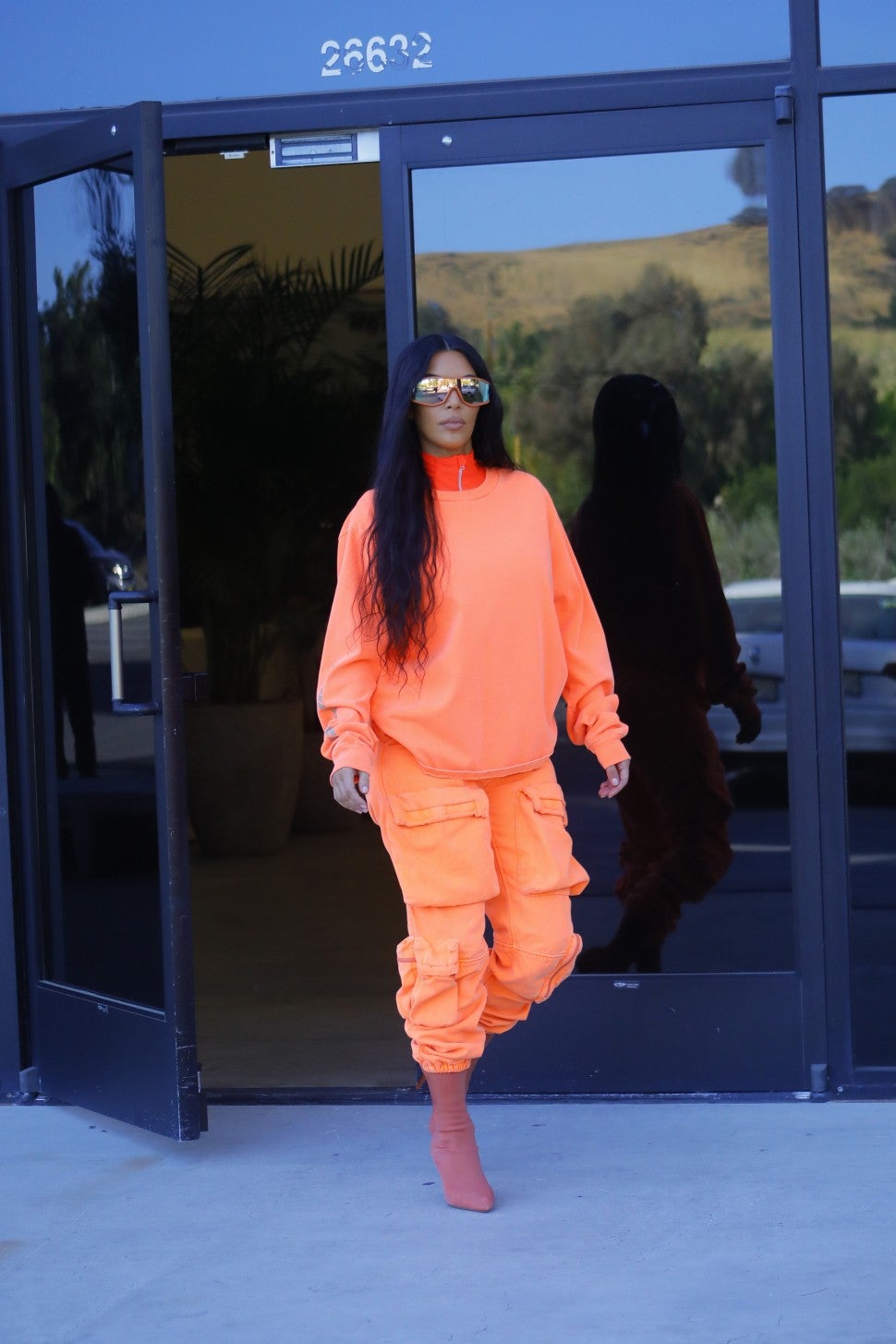 Kim Kardashian in orange outfit