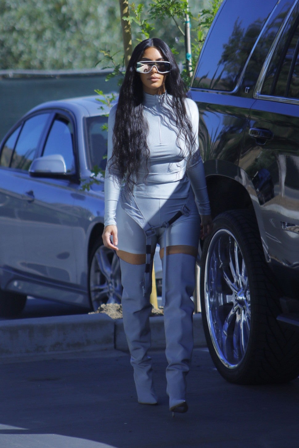 Kim Kardashian in gray futuristic outfit