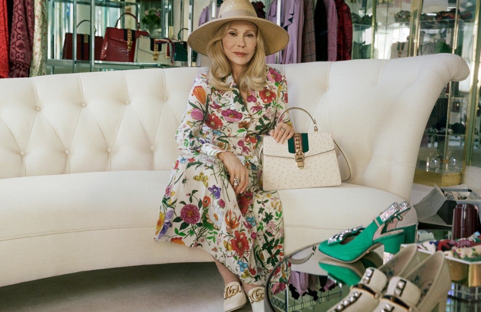 Faye Dunaway Gucci on couch