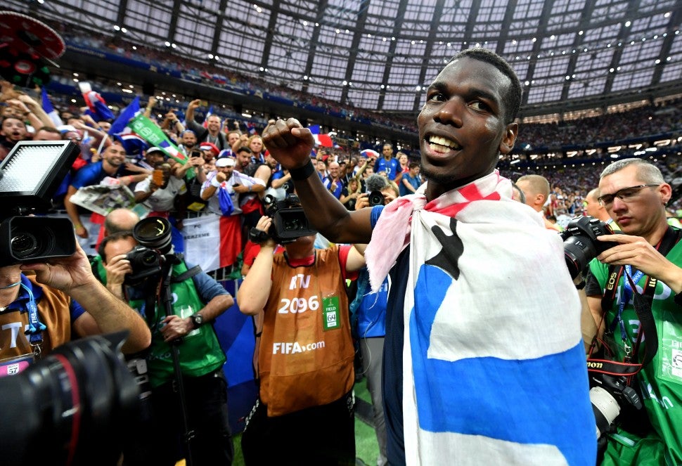 Paul Pogba of France celebrates victory following the 2018 FIFA World Cup Final between France and Croatia at Luzhniki Stadium on July 15, 2018 in Moscow