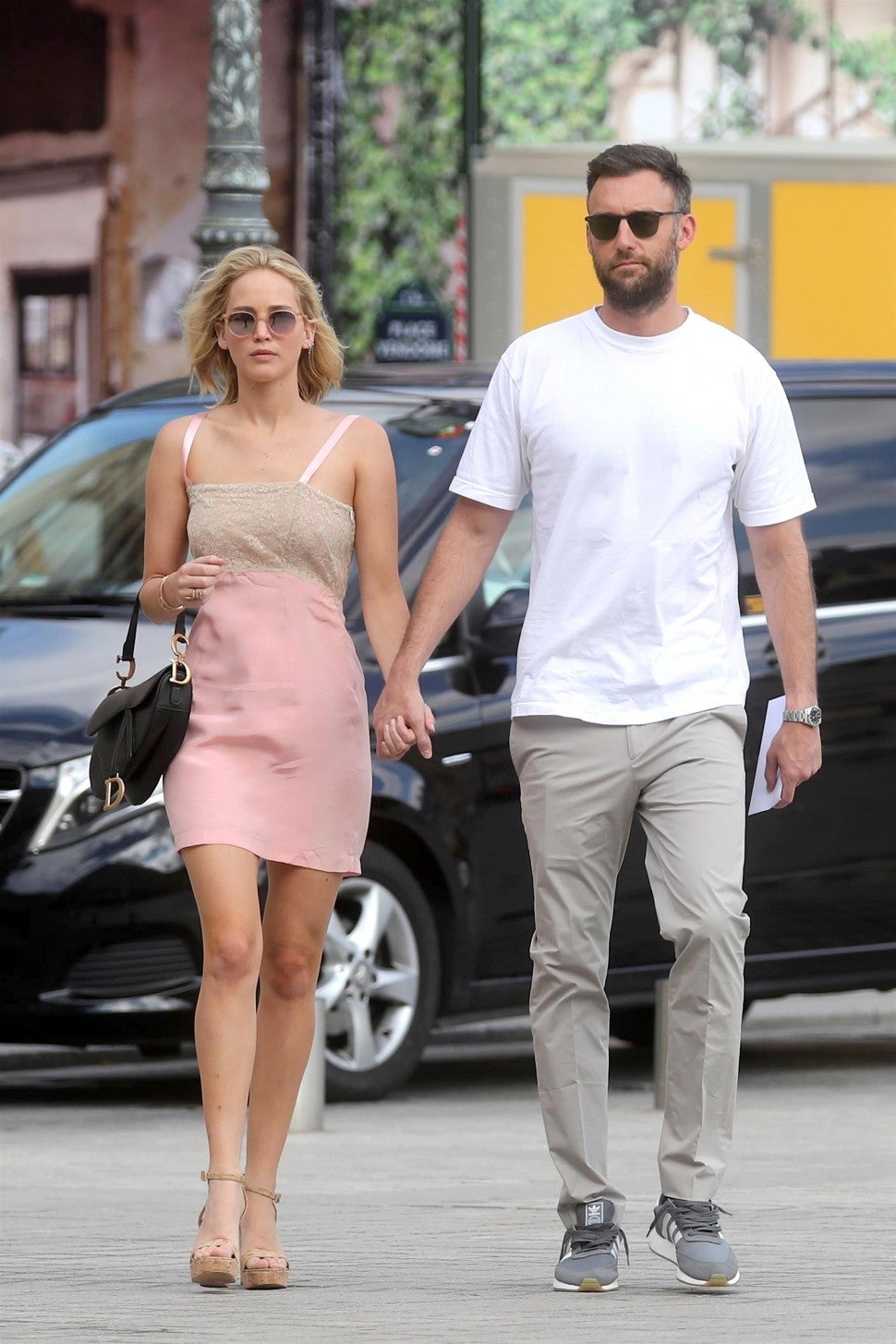 Jennifer Lawrence in pink dress with boyfriend Cooke Maroney
