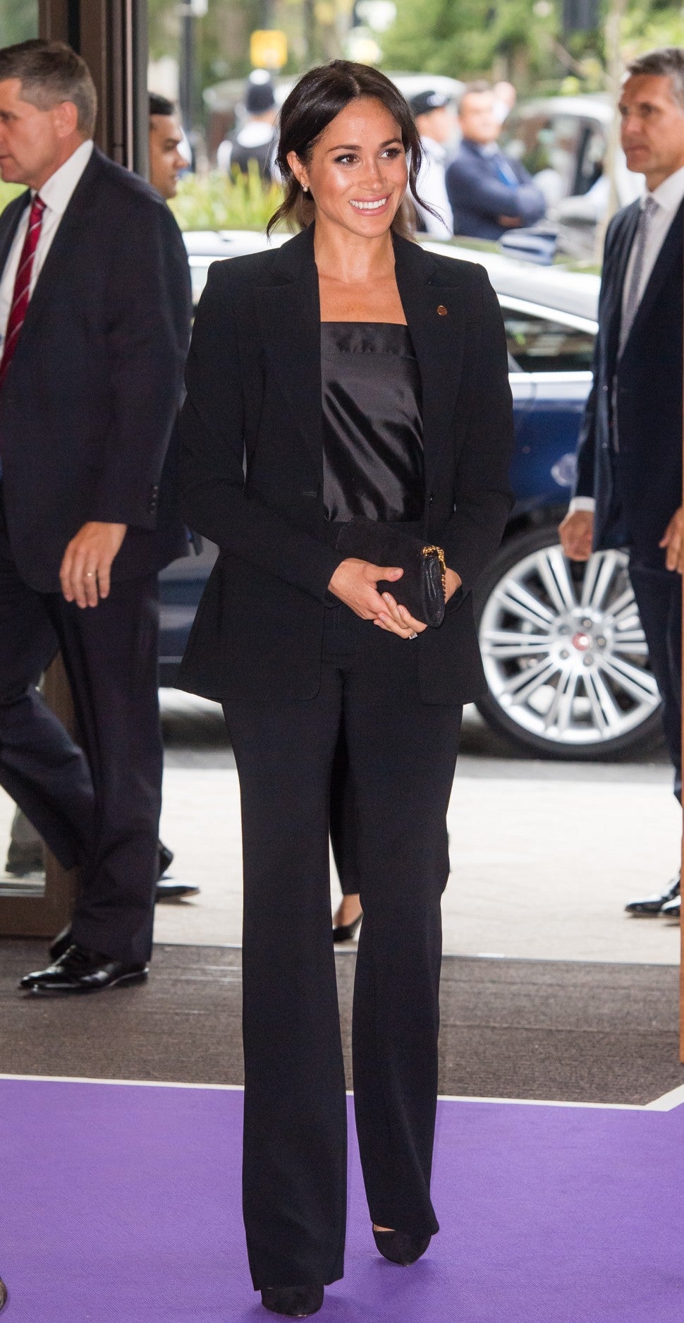 Meghan Markle in black Altuzarra pantsuit