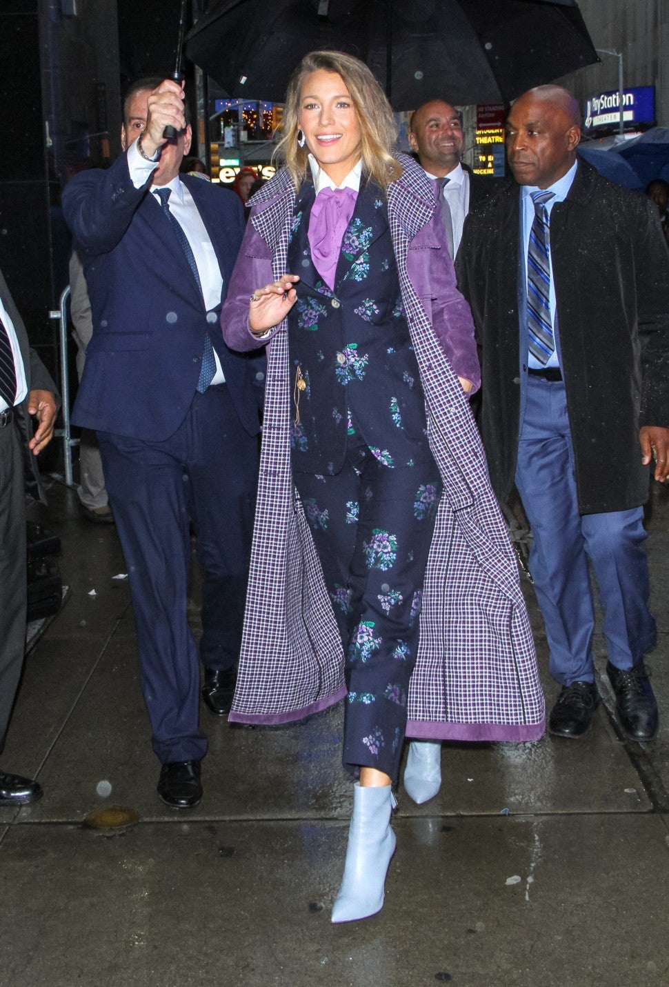 Blake Lively in printed suit in the rain