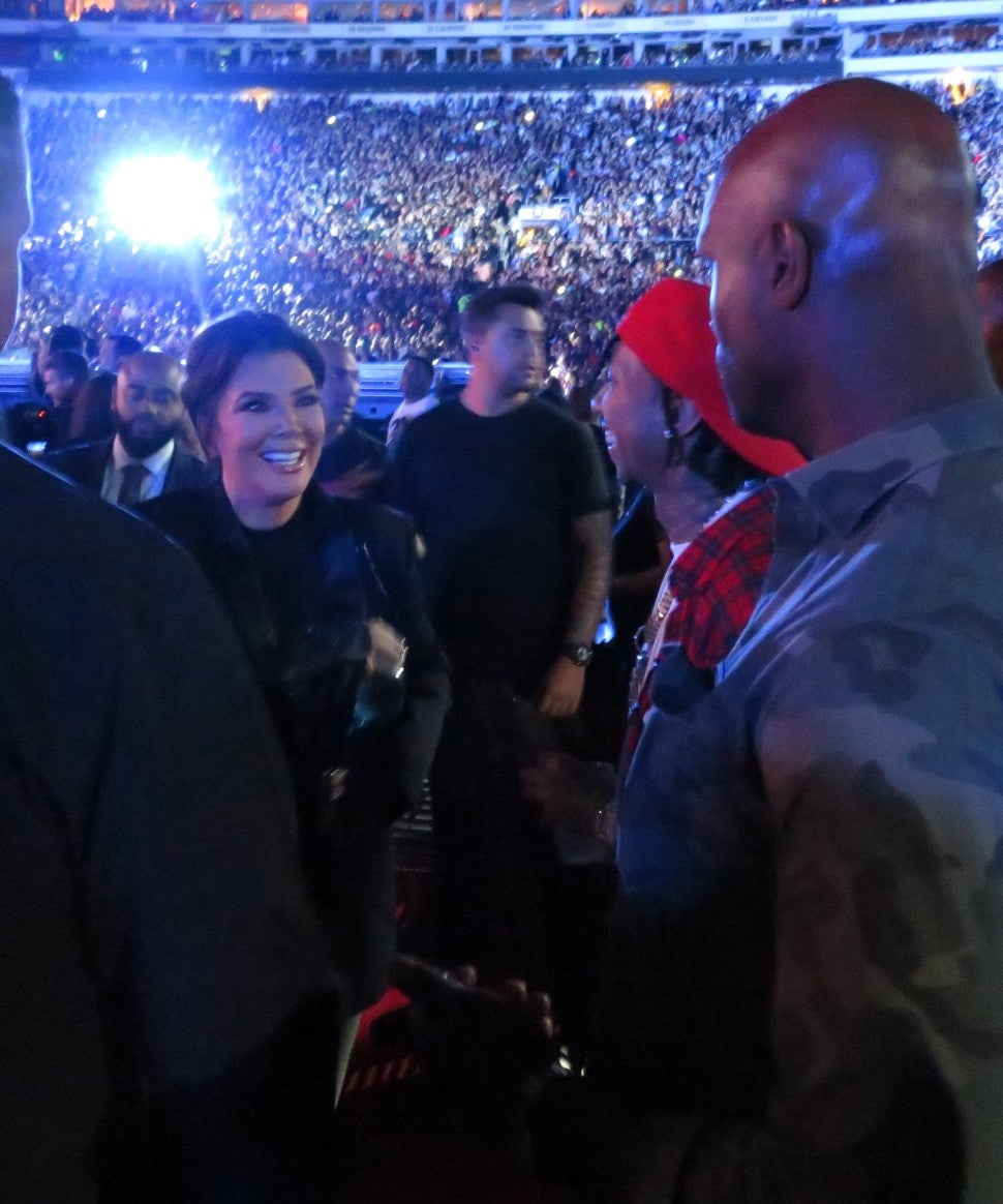 Kris Jenner runs into Tyga at Beyonce and JAY-Z's On the Run II concert on Sept. 23, 2018.