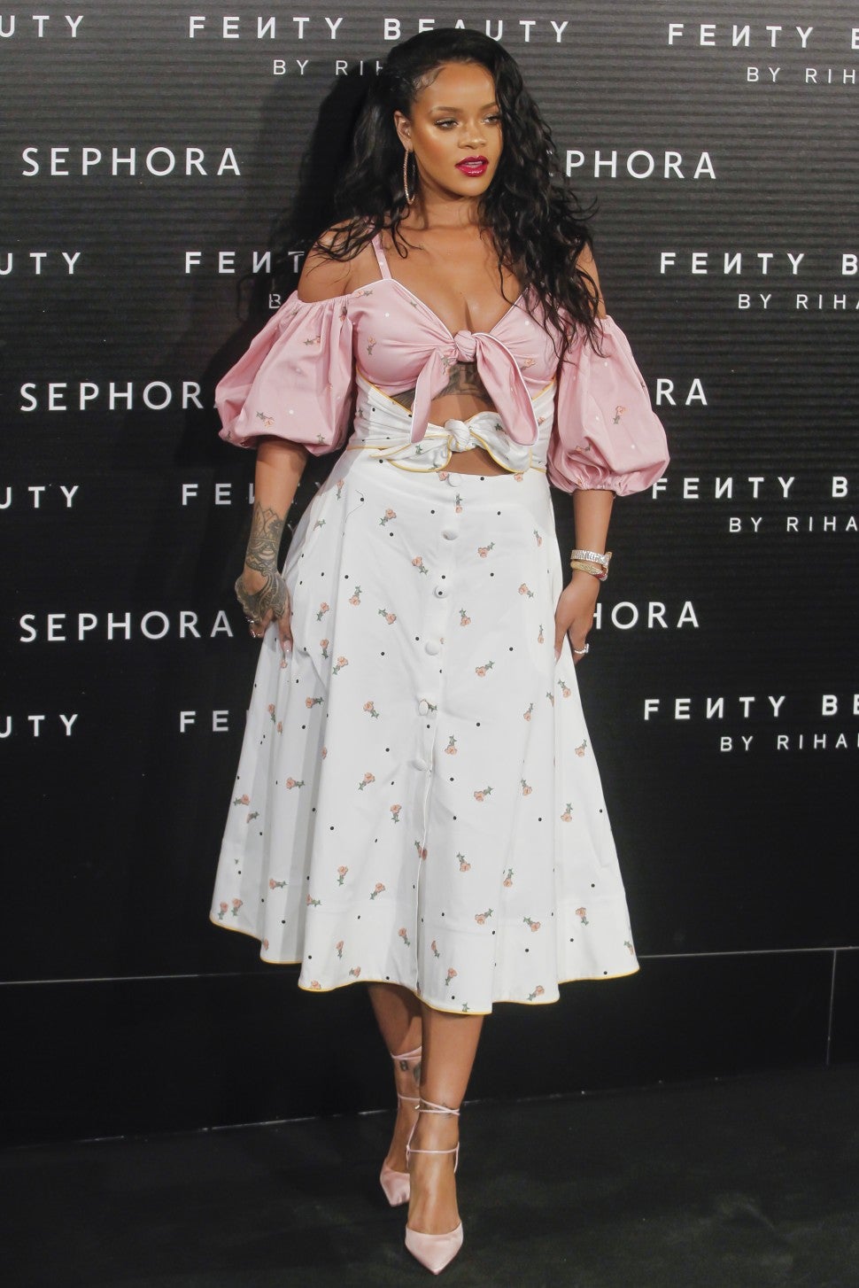 Rihanna at Fenty event in floral dress splash