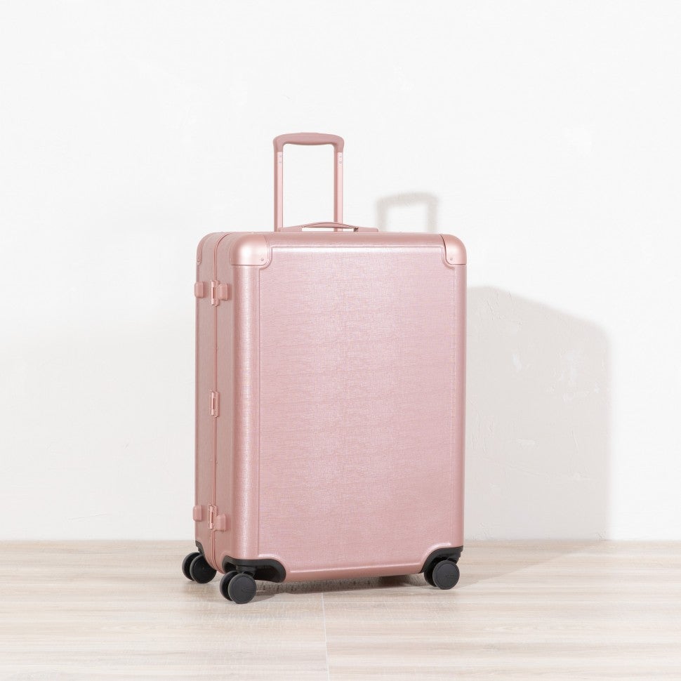 Jen Atkin x CALPAK pink luggage