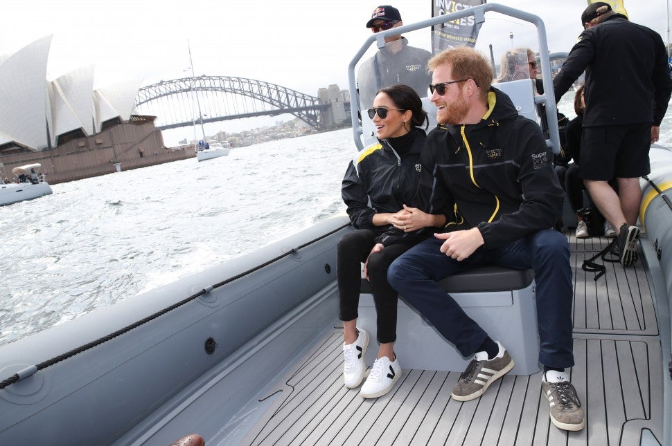 Prince Harry, Duke of Sussex and Meghan, Duchess of Sussex on Sydney Harbour looking out at Sydney Opera House and Sydney Harbour Bridge during day two of the Invictus Games Sydney 2018 at Sydney Olympic Park on October 21, 2018 in Sydney, Australia.