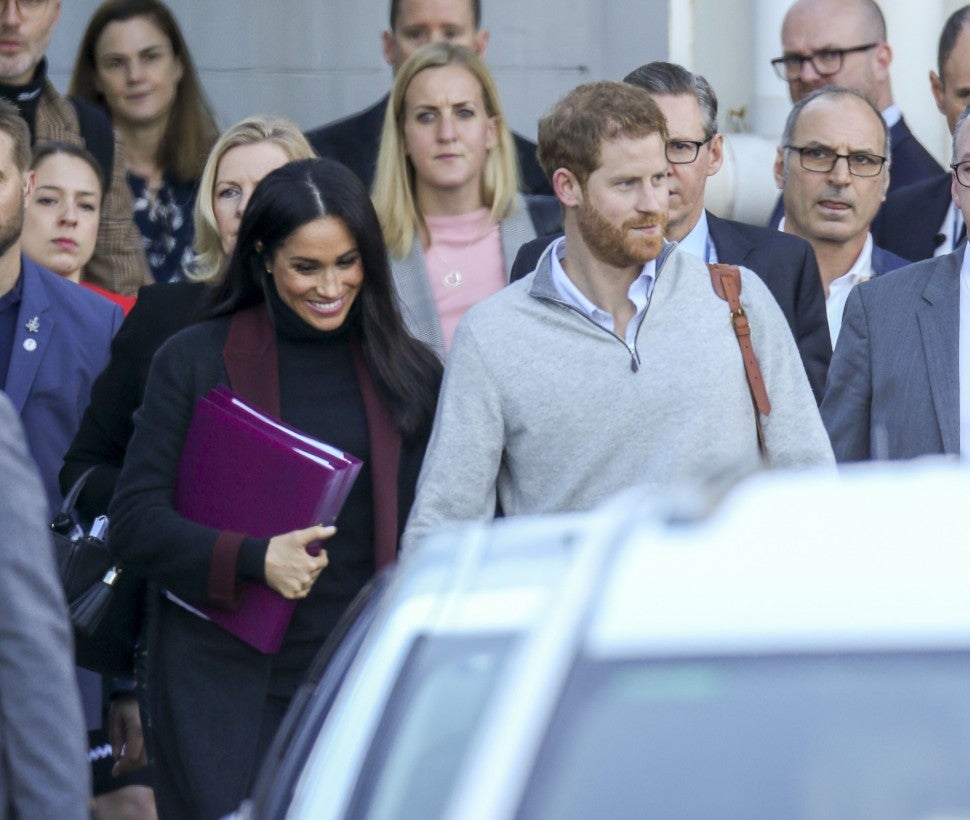 Prince Harry and Meghan Markle,  arrive at Sydney airport ahead of their Royal Tour of Australia on Oct. 14