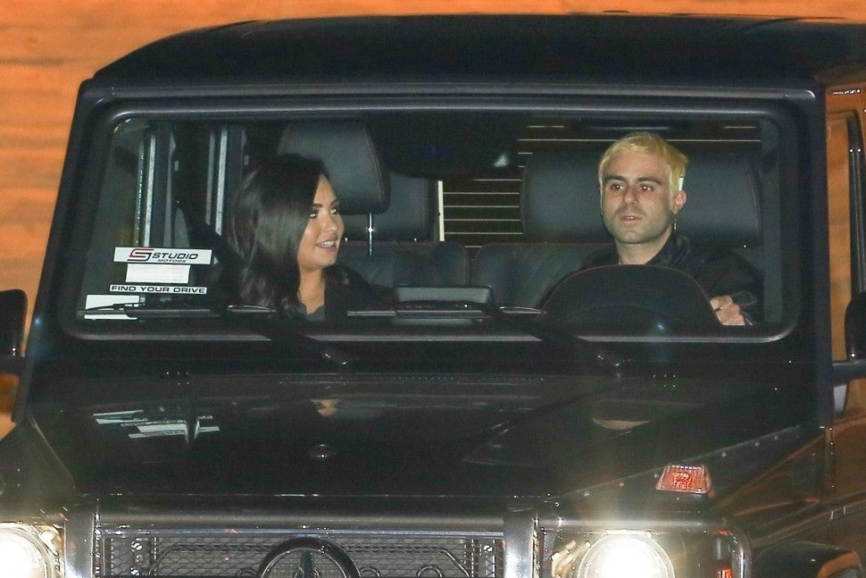 Demi Lovato and Henry Levy out to dinner at Nobu on Dec. 8, 2018.