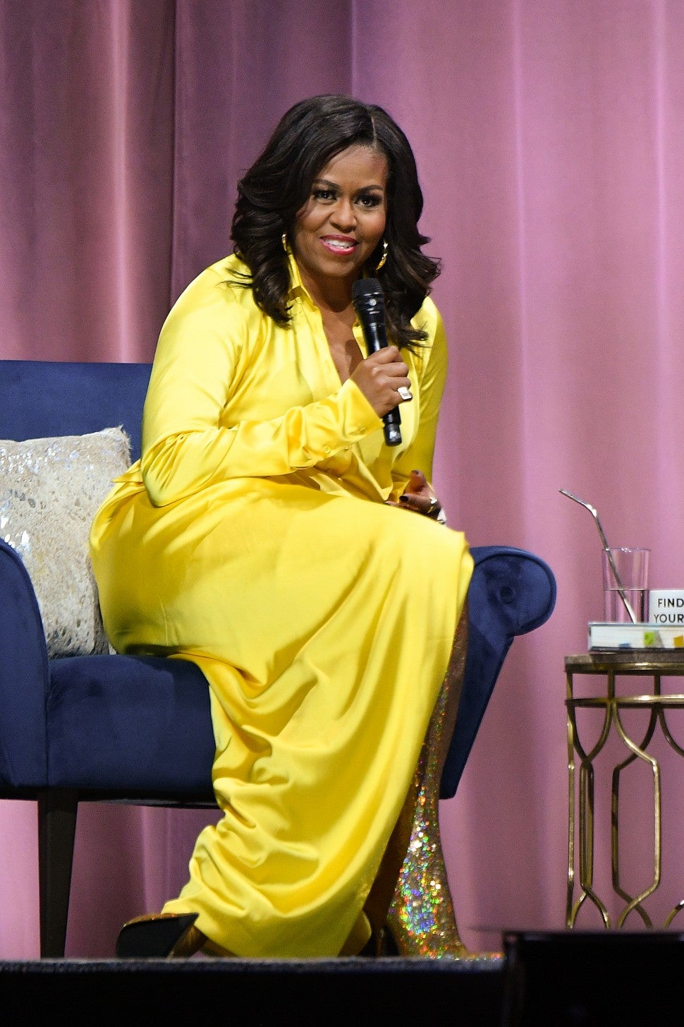 Michelle Obama in yellow dress and glitter boots