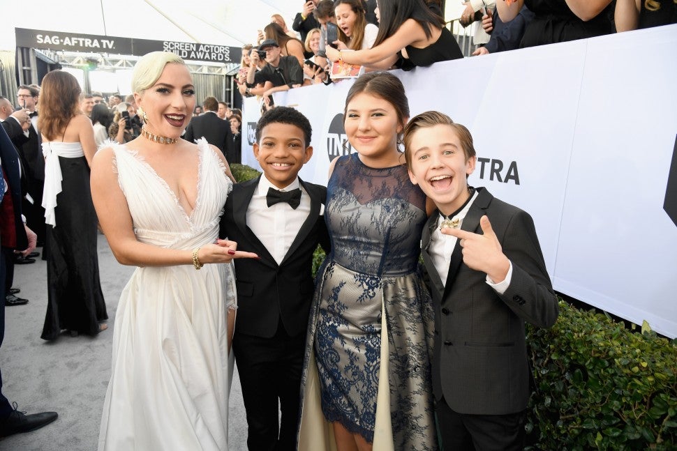 Lady Gaga, Lonnie Chavis, Mackenzie Hancsicsak, and Parker Bates attend the 25th Annual Screen Actors Guild Awards at The Shrine Auditorium on January 27, 2019 in Los Angeles, California.