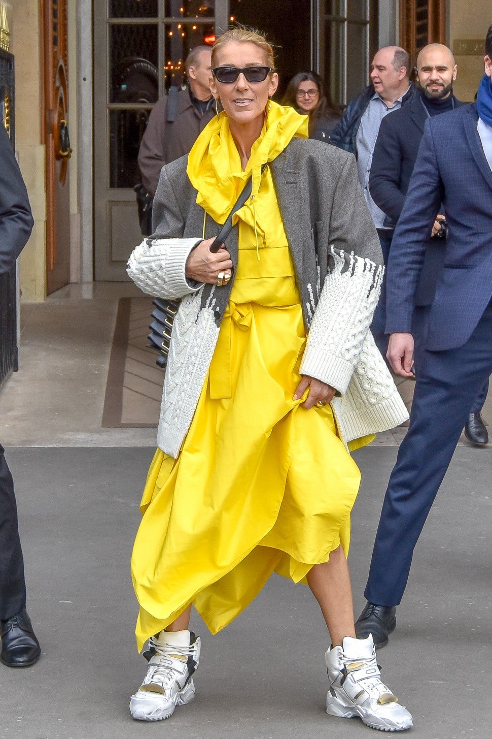 Celine Dion in yellow sporty maxi dress in Paris