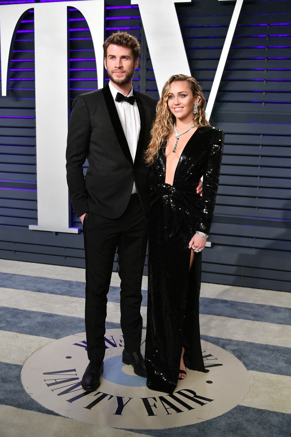 Miley Cyrus and Liam Hemsworth at Vanity Fair Oscar party