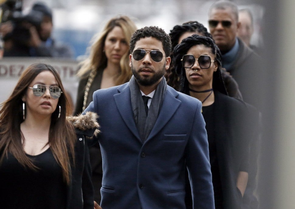 Jussie Smollett arrives at the Leighton Criminal Courthouse on March 14, 2019 in Chicago, Illinois. Smollett stands accused of arranging a homophobic, racist attack against himself in an attempt to raise his profile because he was dissatisfied with his salary on the Fox television drama 'Empire.' 