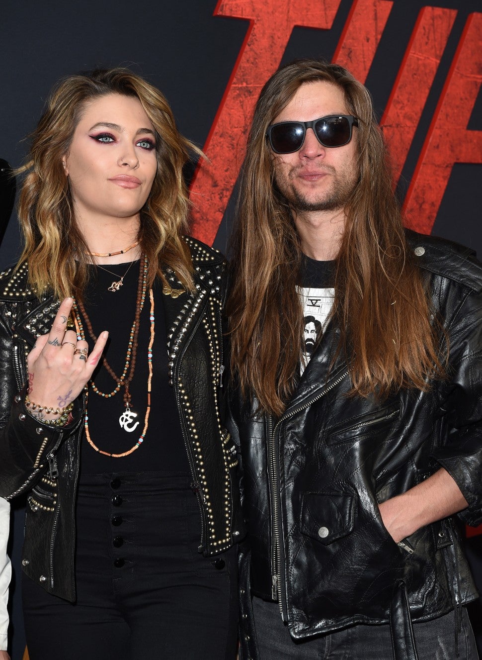 Paris Jackson and Gabriel Glenn arrive at the premiere of Netflix's 'The Dirt' at ArcLight Hollywood on March 18, 2019 in Hollywood, California. 