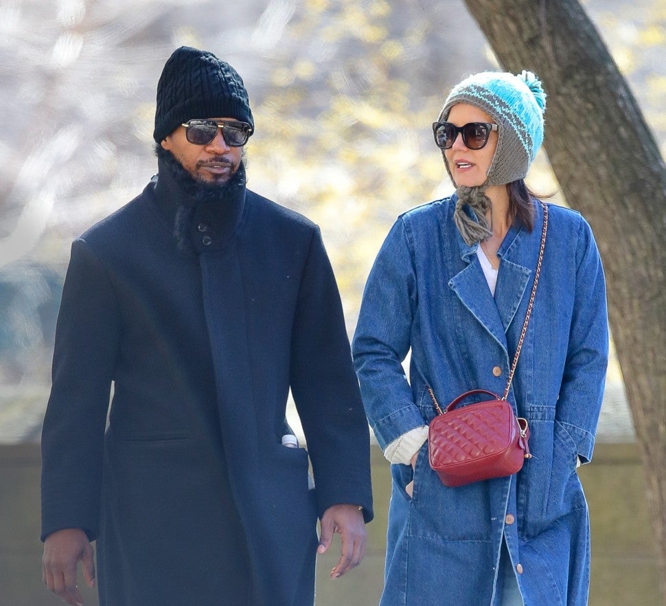 Katie Holmes and Jamie Foxx taking a romantic stroll by Central Park on March 26, 2019.