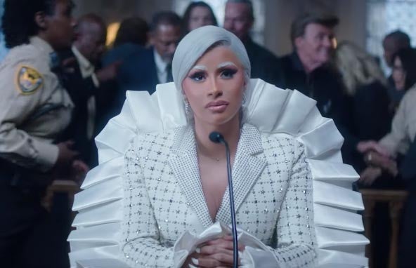 Cardi B press music video viktor & rolf suit in courthouse