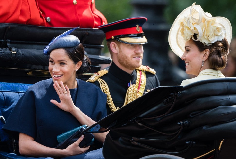 Prince Harry, Duke of Sussex. Meghan, Duchess of Sussex and Catherine, Duchess of Cambridge ride by carriage down the Mall during Trooping The Colour, the Queen's annual birthday parade, on June 08, 2019 in London, England. 