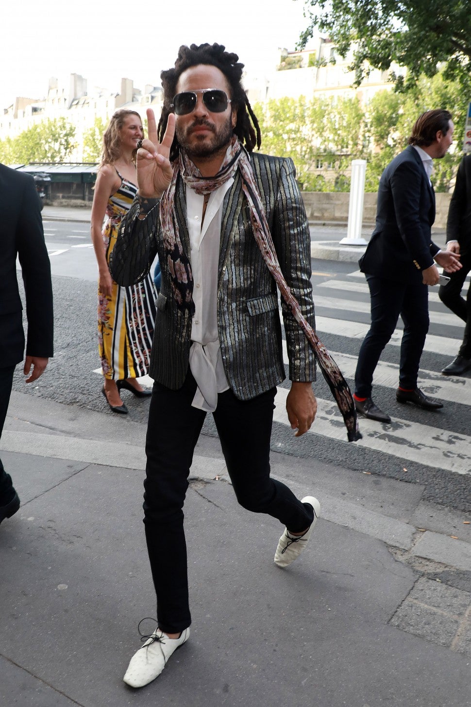 Lenny Kravitz arrives at a dinner at 'La Perouse' restaurant where a dinner is given to celebrate Zoe Kravitz and Karl Glusman's wedding on June 28, 2019 in Paris, France.