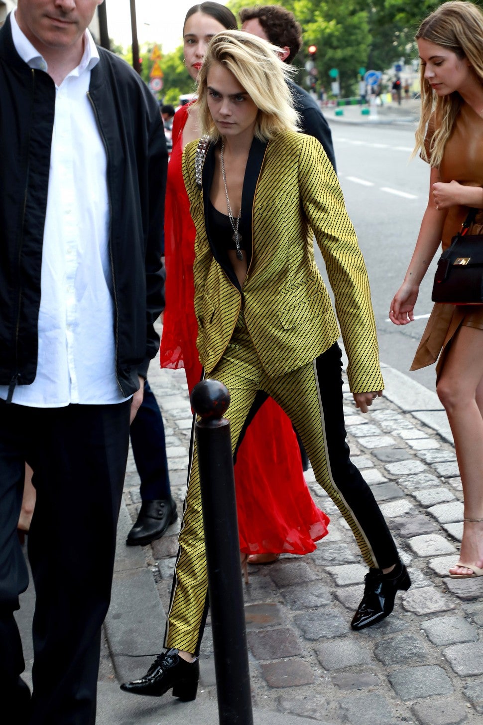 Cara Delevingne arrives at Laperouse restaurant where a pre-wedding dinner for Zoe Kravitz and Karl Glusma is to be held on June 28, 2019 in Paris, France.